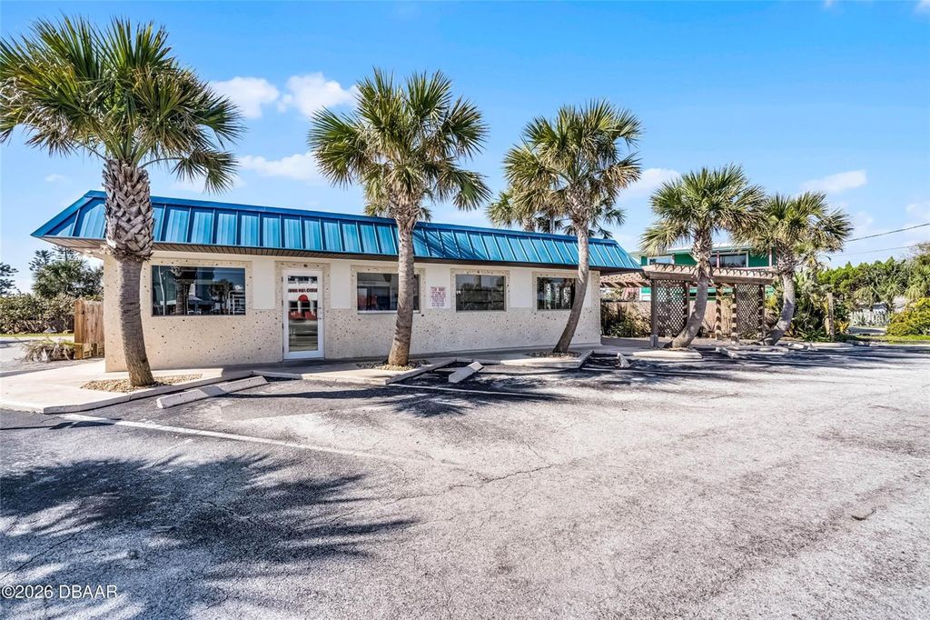 Photo of 819 Sr A1a Highway, New Smyrna Beach, FL 32169 (MLS # NS1087939)