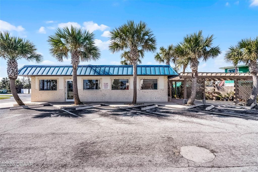 Photo of 819 Sr A1a Highway, New Smyrna Beach, FL 32169 (MLS # NS1087939)