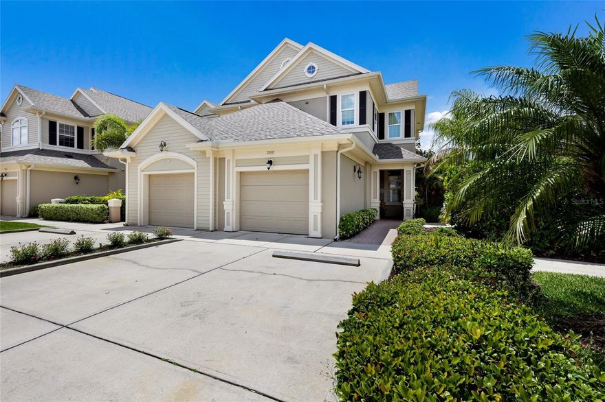 An exceptional opportunity to own a former model home with arguably the most picturesque setting in the neighborhood -- only available due to an unexpected job relocation. This light-filled, ground-floor end unit offers 2 bedrooms plus a bonus room, 2 full baths, an attached garage and two additional parking spaces. A thoughtfully designed open-concept layout that lives both spacious and refined from the moment you enter. Immediately you'll notice idyllic views and upscale finishes including 8-foot doors, elegant tray ceilings, and oversized 18-inch tile and laminate flooring throughout. This is a completely carpet-free home for a clean, modern feel. The contemporary kitchen is both stylish and functional, featuring a brand-new induction range, stainless appliances, neutral wood tone cabinetry, and stone countertops.  Other costly updates that will provide peace of mind and a move in ready space for a new owner, include crisp white paint of all surfaces throughout the home in 2026 (ceilings, base, trim and walls), a 2020 AC system (under maintenance contract), and a 2022 hot water heater.  But the real magic is in the location...Step outside on the lanai to relish in the unobstructed views and sounds of the tranquil, meandering waterfalls at the headwaters of the lagoon. There is truly nothing like it in our market. Savannah Preserve is a meticulously maintained gated neighborhood with new exterior painting, new roofs, fencing, and refreshed landscaping, creating a polished and cohesive environment. Don't wait to see this chic tucked away oasis just 2 minutes to all the shopping and dining your heart could desire.
