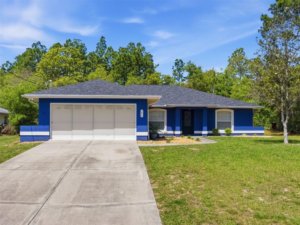 Photo of 7672 N Cricket Drive, Citrus Springs, FL 34434 (MLS # OM722940)