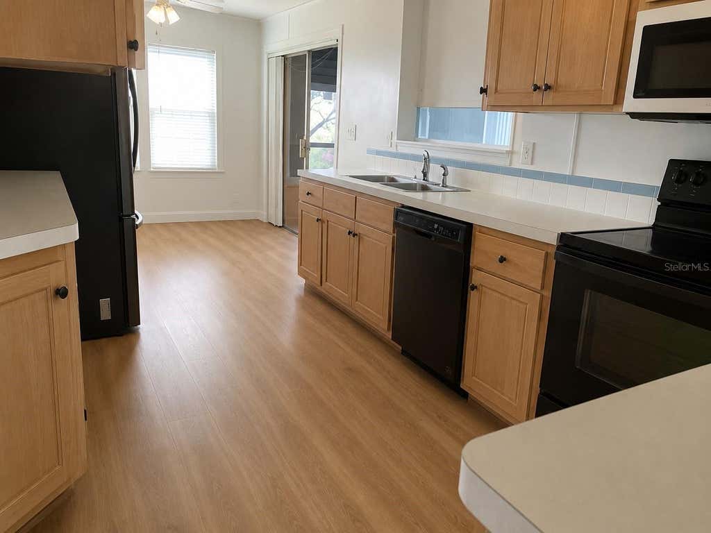 Photo of 37643 Landis Avenue, Zephyrhills, FL 33541 (MLS # O6436073)