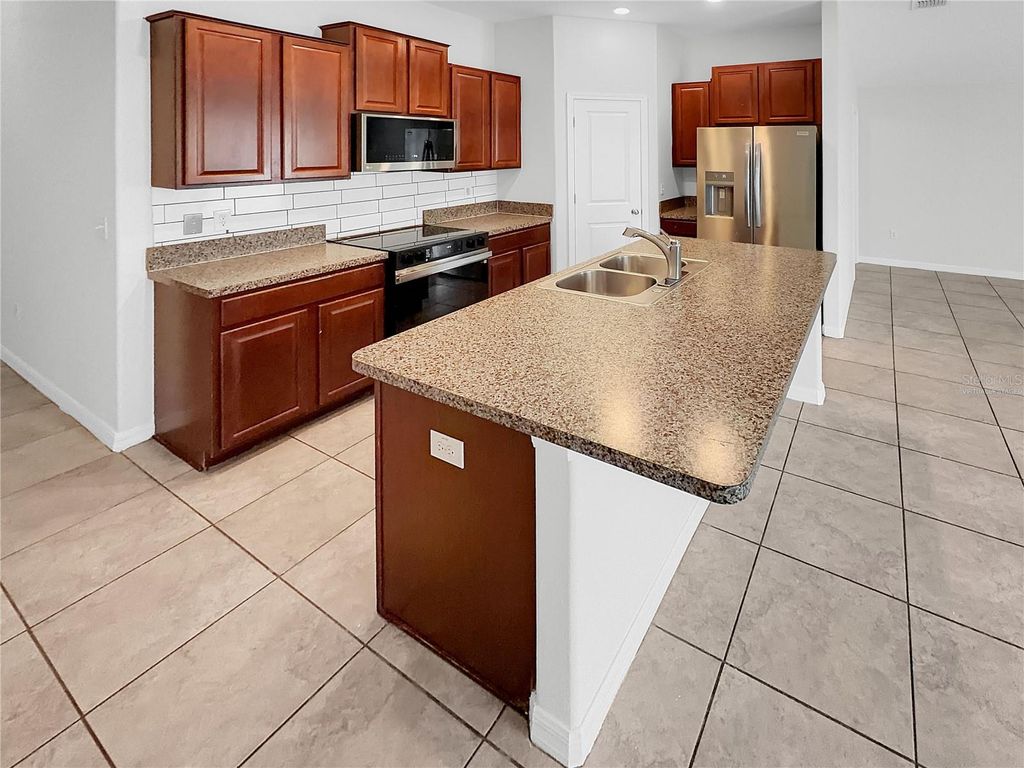 Photo of 10113 Rosemary Leaf Lane, Riverview, FL 33578 (MLS # O6370954)