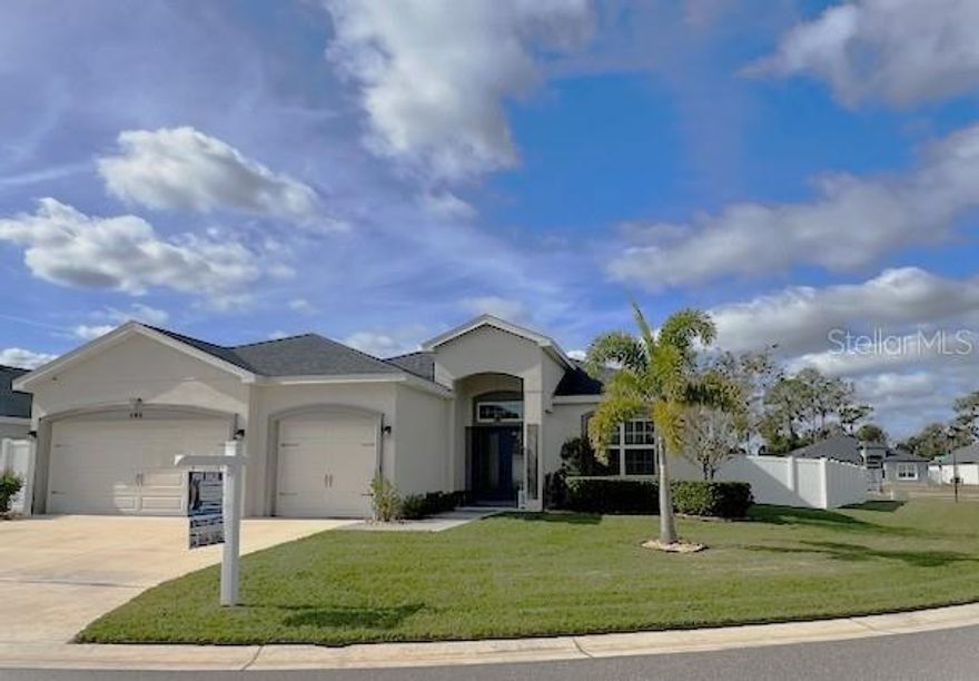 One or more photo(s) has been virtually staged. UPGRADE YOUR ADDRESS WITH THIS MOVE-IN READY HOME FEATURING MULTIPLE UPGRADES AND A HARD-TO-FIND OVERSIZED CORNER LOT in a quiet neighborhood. This home is a beautifully upgraded and meticulously maintained home nestled on a premium corner lot in the highly desirable Bridgeport Lakes community. With striking curb appeal, lush landscaping, and an interior that blends modern luxury with everyday functionality, this property is the perfect place to call home. This home features 4 bedrooms and 3 bathrooms. The primary suite has a spa-like en-suite bathroom. There is also a 2-bedroom suite with a bath and a 4th bedroom, as well as a full guest bath. When entering the home, you step through elegant double front doors with "rain glass" into a bright, open-concept filled with natural light. A versatile flex space to the right makes the perfect living/family room, home office, reading nook, or creative studio, while the dining room to the left sets the stage for memorable family meals and entertaining. At the heart of the home is a chef-inspired kitchen featuring state-of-the-art Samsung BESPOKE appliances, including an induction range with built-in air fryer and a sleek glass-panel refrigerator and beverage center. Solid wood cabinetry and stylish bullnose countertops provide both beauty and functionality, flowing seamlessly into the spacious living area. The living room features a room-darkening pleated shade on the slider for enhanced privacy and energy efficiency. Enjoy brand-new luxury vinyl plank flooring throughout, paired with upgraded 5½-inch baseboards for a clean finish. The expansive primary suite is your private retreat, complete with tray ceilings, recessed lighting, and a large custom-designed walk-in closet with movable shelves and rods created by Cabinets by Design. The spa-like en-suite bathroom offers a dual-sink vanity, oversized walk-in shower, and a luxurious garden tub. The home offers a second primary suite on the opposite side of the home—perfect for guests or multi-generational living—features its own private entrance, en-suite bath, and a custom closet with barn doors and high-end closets by Closets by Design. Additional highlights include: All fixtures, lighting, and hardware have been updated to reflect today’s design trends. A stylish and functional laundry room with custom cabinetry/shelving and top-of-the-line LG front-load washer and dryer. Screened lanai overlooking a fully fenced backyard with single and double gate access. Programmable outdoor lighting and a full irrigation system covering the front, side, and rear yards, and emitter sprinklers for the front and back flower beds. Don’t miss your chance to own this exceptional home in one of Mulberry’s most sought-after communities. Home is not homesteaded.