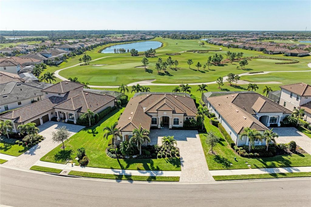 Photo of 5572 Mulligan Way, Lakewood Ranch, FL 34211 (MLS # A4674841)