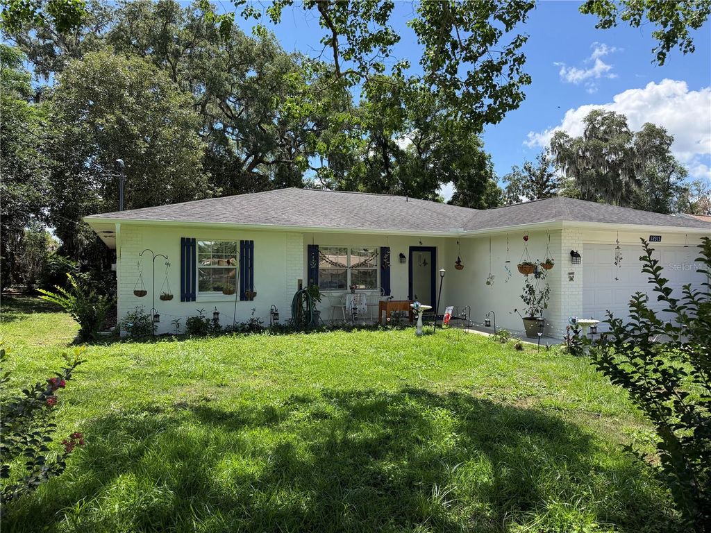 Photo of 12315 SE 60th Terrace, Belleview, FL 34420 (MLS # G5113371)