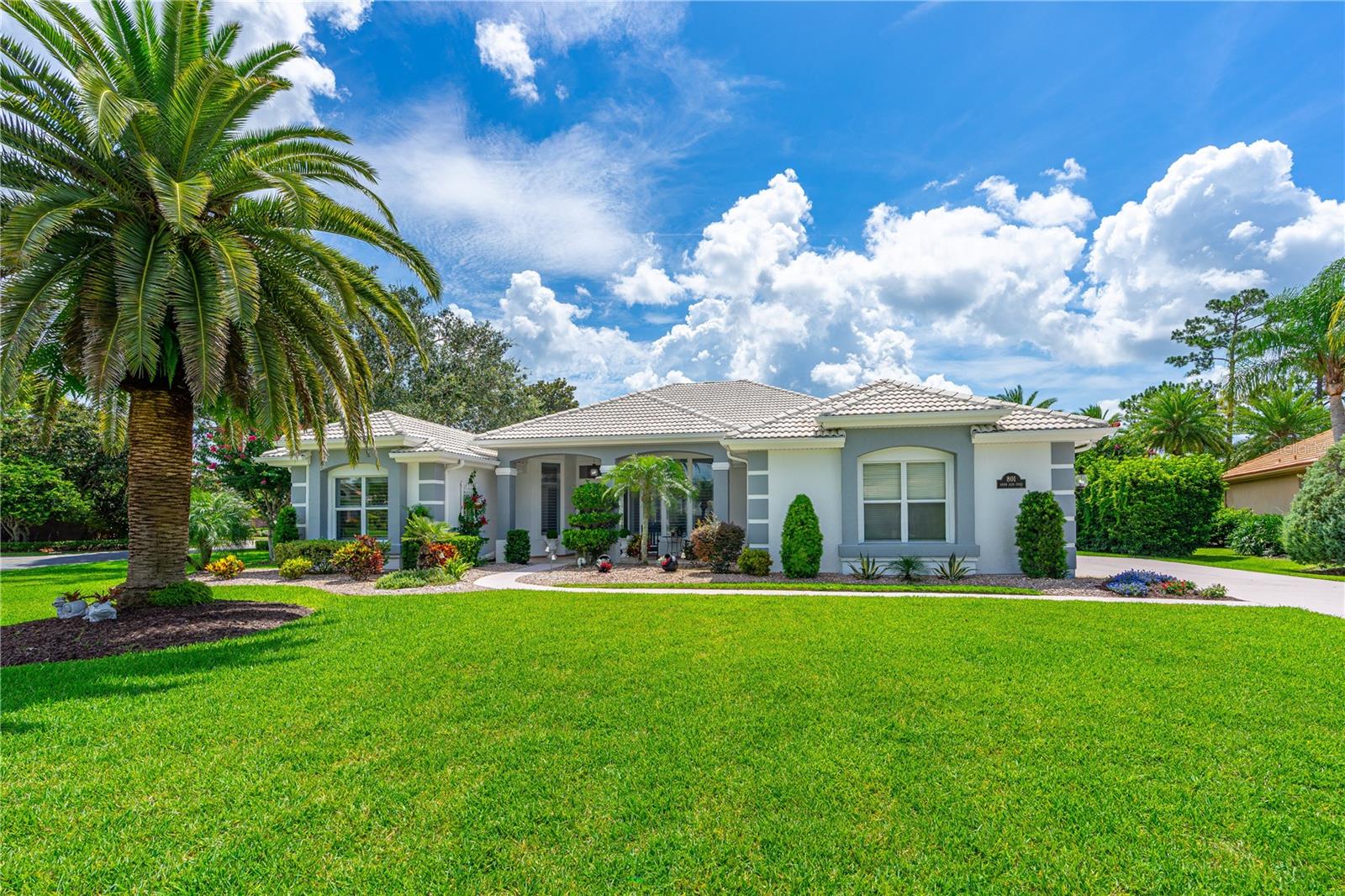 Welcome to your private retreat in Plantation Bay Golf Community! Perfectly positioned on a spacious corner lot, this stunning 4 bed, 3 bath pool home offers the ultimate blend of elegance, comfort, and resort-style living. Inside, you'll find a light-filled open floor plan with fresh interior and exterior paint and brand-new plantation shutters throughout, adding a touch of timeless sophistication.
The heart of the home is the chef’s kitchen—complete with granite countertops, Samsung steel appliances, and custom cabinetry—perfect for everything from quiet mornings to lively gatherings. The inviting living area features hardwood floors and soaring ceilings, creating a seamless flow for entertaining. The luxurious primary suite has a spa-like bath with a soaking tub, walk-in shower, and dual vanities for your own slice of serenity.
Step outside to your private, screened-in lanai with sparkling pool and spa, all surrounded by lush tropical landscaping—your own backyard oasis. A three-car garage with a premium floor coating provides durability and style, ideal for hobbyists or gear storage.
With your golf cart ready and clubs in tow, you’re just moments from fairways and friends. Plantation Bay residents enjoy access to championship golf, tennis, pickleball, fitness facilities, a clubhouse, and so much more within this vibrant gated community.
Don’t miss this rare opportunity to own a meticulously maintained home where comfort meets sophistication. Schedule your private showing today and experience the lifestyle you deserve!
Square footage received from tax rolls. All information recorded in MLS intended to be accurate but cannot be guaranteed.