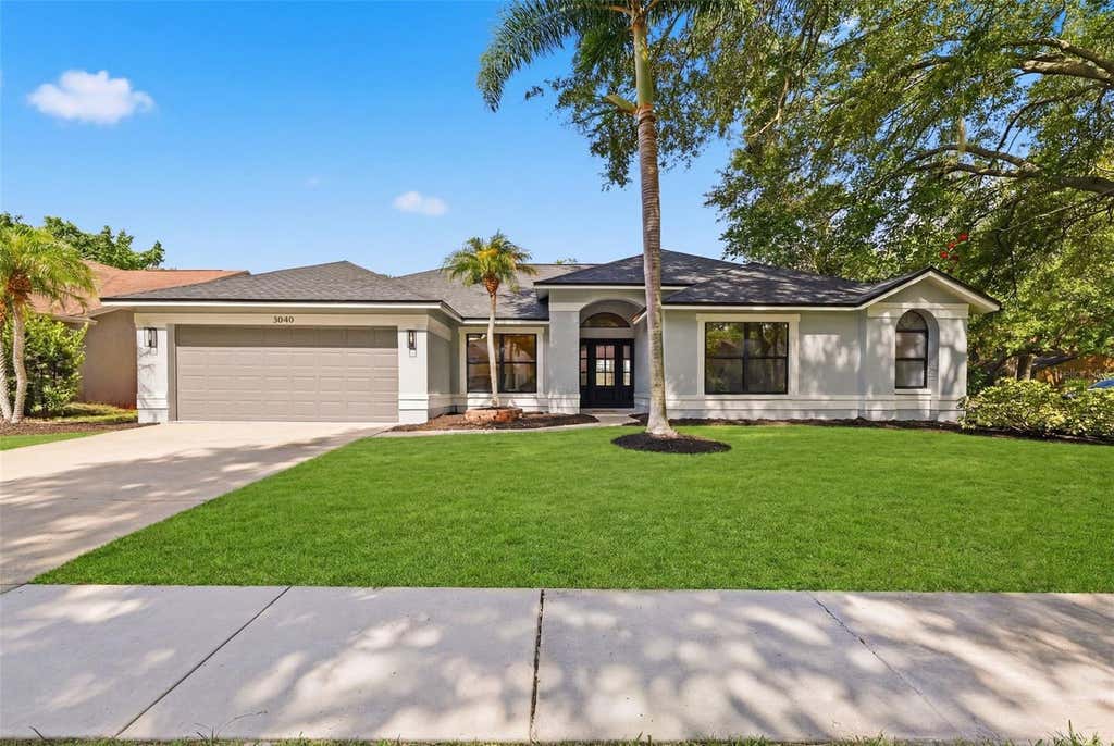 Photo of 3040 Windridge Oaks Drive, Palm Harbor, FL 34684 (MLS # TB8541177)
