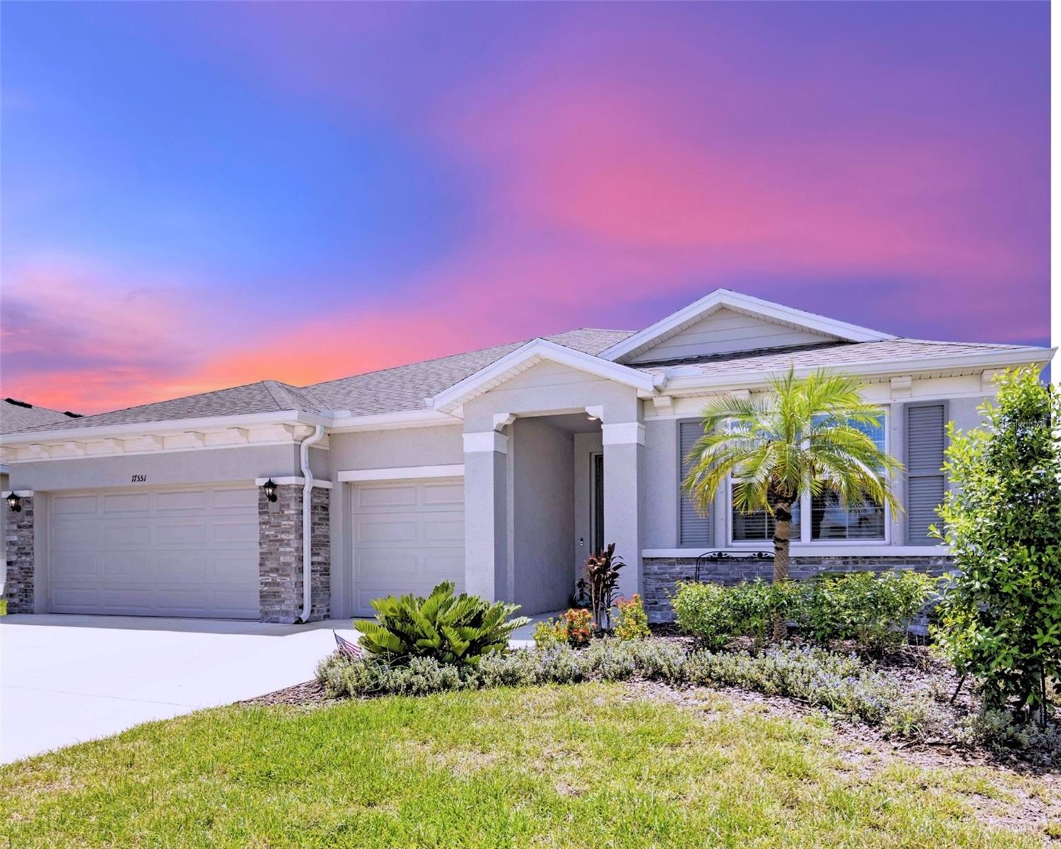 Have you been looking for a ONE-Story, 4-Bedroom POOL HOME with an OFFICE in Lakewood Ranch? HERE IT IS!
Welcome to 17551 Cantarina Cove, a recently built 4-bedroom, 3.5-bath home with 2,838 sq ft of living space, located in beautiful Lakewood Ranch.
This home offers true Florida living with a screened-in Heated Saltwater Pool, Large Covered Lanai, and Peaceful Pond View, perfect for relaxing or entertaining year-round. The open-concept layout features high ceilings, abundant natural light, and a gourmet kitchen with granite countertops, stainless steel appliances, and a large island.
A standout feature is the creatively converted eat-in kitchen space, now a stylish office overlooking the pool—a rare and functional upgrade for remote work or study. The spacious owner’s suite features a spa-like bath and walk-in closet, while the Next Gen Suite, complete with a private bath and Second Living Space, offers comfort and flexibility for guests or multigenerational living. Three Car Garage, Triple-wide Driveway, In-ground Sprinkler System, and Maintenance Free Lawn Care. Want more? High Efficiency HVAC System, Direct Return AC, Nano Light Air Purifier, Storm Proven Windows, Cement Block, Solid Core Reinforcement Within House, and Blinds throughout!
All this in the heart of Lakewood Ranch—close to top-rated schools, parks, shopping, dining, and everything the Gulf Coast has to offer. A quick walk to the new LWR Library, around the corner from the coming soon Aquatic and Pickleball Center, and just down the road from the Brand New Lake Manatee Pk4-8th grade school. This location can't be beat! Plus on any given Tuesday night you can catch a sunset on any number of world famous beaches!
This is one you can't miss! Reach out to Noelle to schedule a showing.
