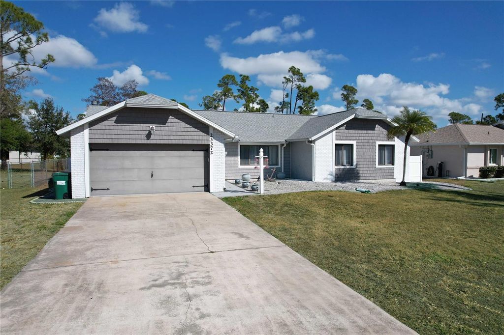 Photo of 23372 Olean Boulevard, Punta Gorda, FL 33980 (MLS # L4959340)