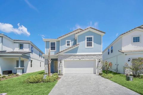 Photo of 7263 Oakmoss Loop, Davenport, FL 33837 (MLS # O6310194)