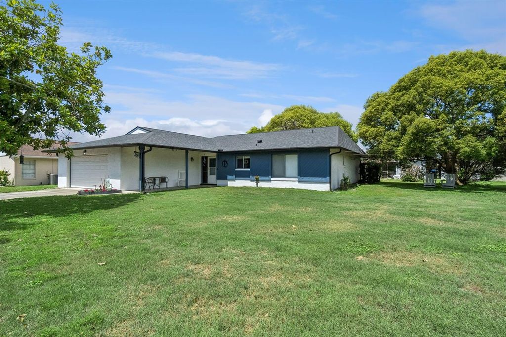 Photo of 10044 Garrison Lane, Orlando, FL 32821 (MLS # O6408307)