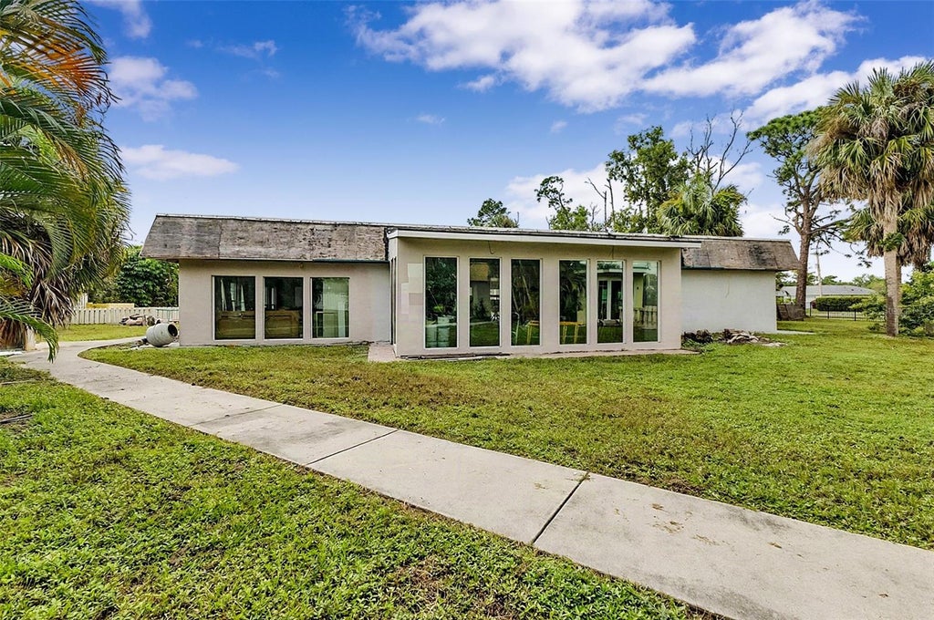 Photo of 4231 Erindale Drive, North Fort Myers, FL 33903 (MLS # A4709525)