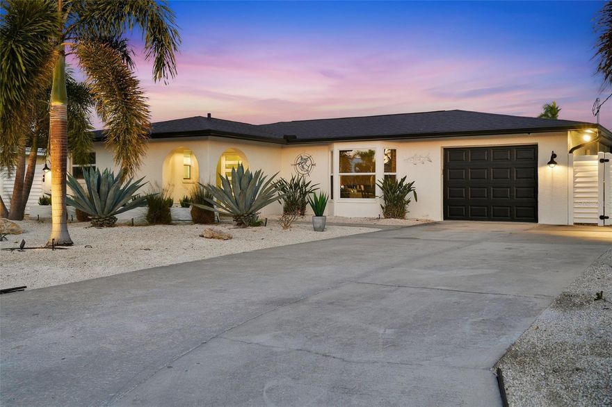 Meticulously renovated waterfront home with no HOA, offering turnkey Florida living with exceptional long-term value. This property did **NOT* flood and has undergone almost $500,000 in recent upgrades, including a NEW ARCHITECTURAL SHINGLE ROOF , fully remodeled resort-style pool and spa with all-new equipment, FULL REPLACEMENT OF THE SEWEGE DRAIN LINE, COMPLETE RE- PIPE of water supply lines, fresh INTERIOR and EXTERIOR PAINT, IMPACT RATED front and garage doors, new GUTTERS and downspouts, PVC fencing, and a 15,000-lb boat lift with new pilings and lighting. (Ask for flyer of All upgrades) .A new panoramic screen enclosure, remodeled pool deck with leathered marble pavers, modernized exterior lighting, and turf add to this outdoor transformation. Inside, the home features a fully remodeled kitchen and bathrooms, luxury vinyl plank flooring, custom closets, upgraded lighting, motorized shades, and designer finishes throughout—delivering a truly move-in-ready, low-maintenance residence that feels brand new. Direct access to inshore and offshore waters, this property is ideal for boating, fishing, full-time living, or short-term rental income. Ideally situated just two miles from Bradenton Beach and steps from the charming Cortez Fishing Village, with quick access to Anna Maria Island, Longboat Key, St. Armands Circle, and Lido Key. Furnishings and boat available for purchase separately.