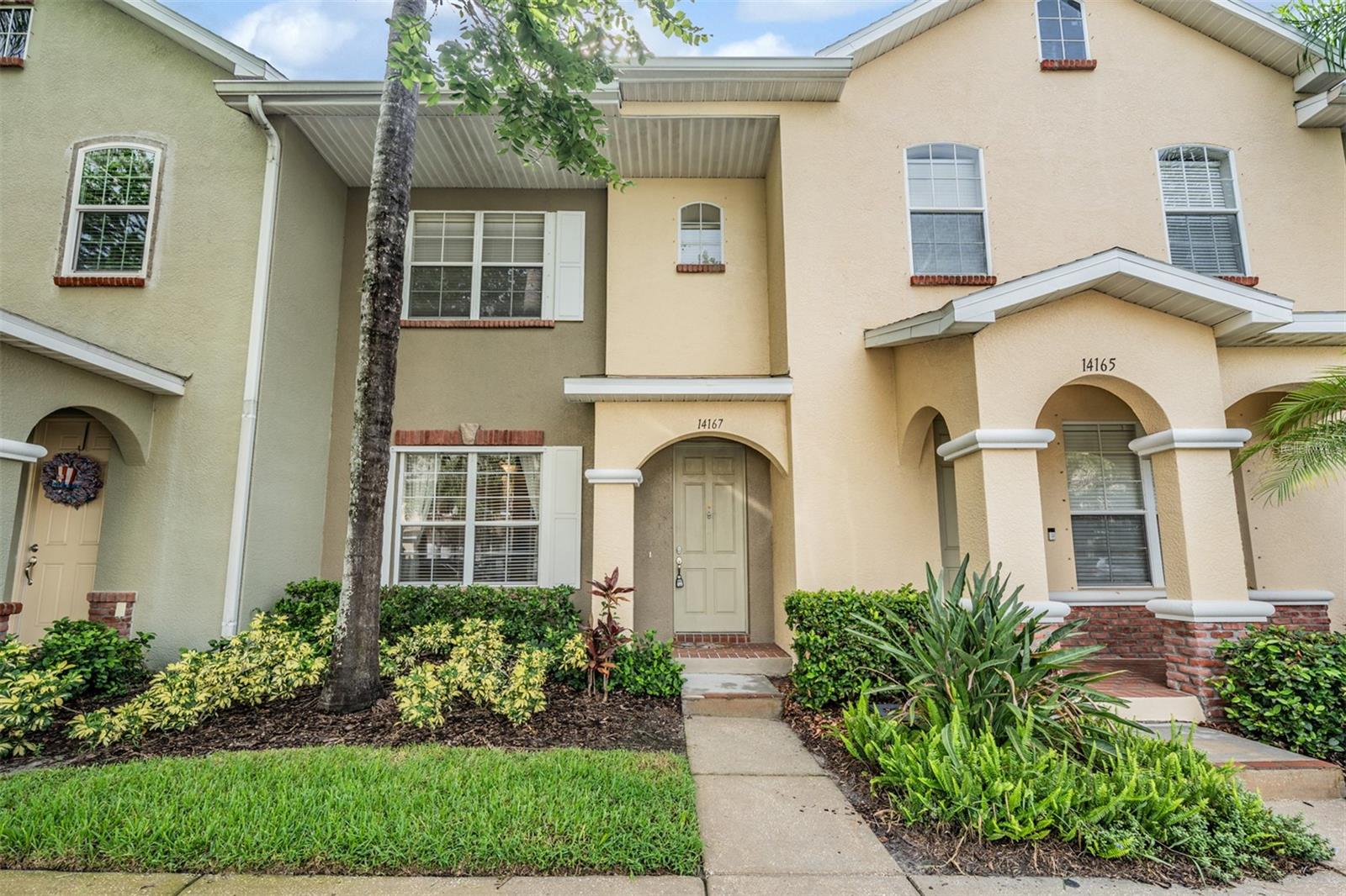 Tucked away in a charming, walkable community, this 2 bedroom, 2.5 bath townhome with a 2-car garage offers the perfect blend of comfort and convenience. Built in 2006, the home features a spacious combo living and dining room with a pass-through breakfast bar to the kitchen—complete with wood cabinetry, granite countertops, and stainless steel appliances. A half bath is located on the main floor for guests' convenience.
Step out from the kitchen into a private, screened covered courtyard that leads to the rear-entry 2-car garage—plus there’s street parking right in front of the unit for added flexibility. Hurricane shutters are stored in the garage for peace of mind.
Upstairs, both bedrooms are private suites with walk-in closets and their own ensuite baths. The hallway also houses a full-size washer and dryer closet for added functionality.
Enjoy the ease of urban-style living in a peaceful, residential setting—just steps from shoppin, dining, banking, and even an urgent care center. A brand-new Aldi grocery store is coming soon, making everyday living even more convenient! Close to Citrus Park, Westchase and less than 30 minutes to Tampa International. The community pool makes it complete!