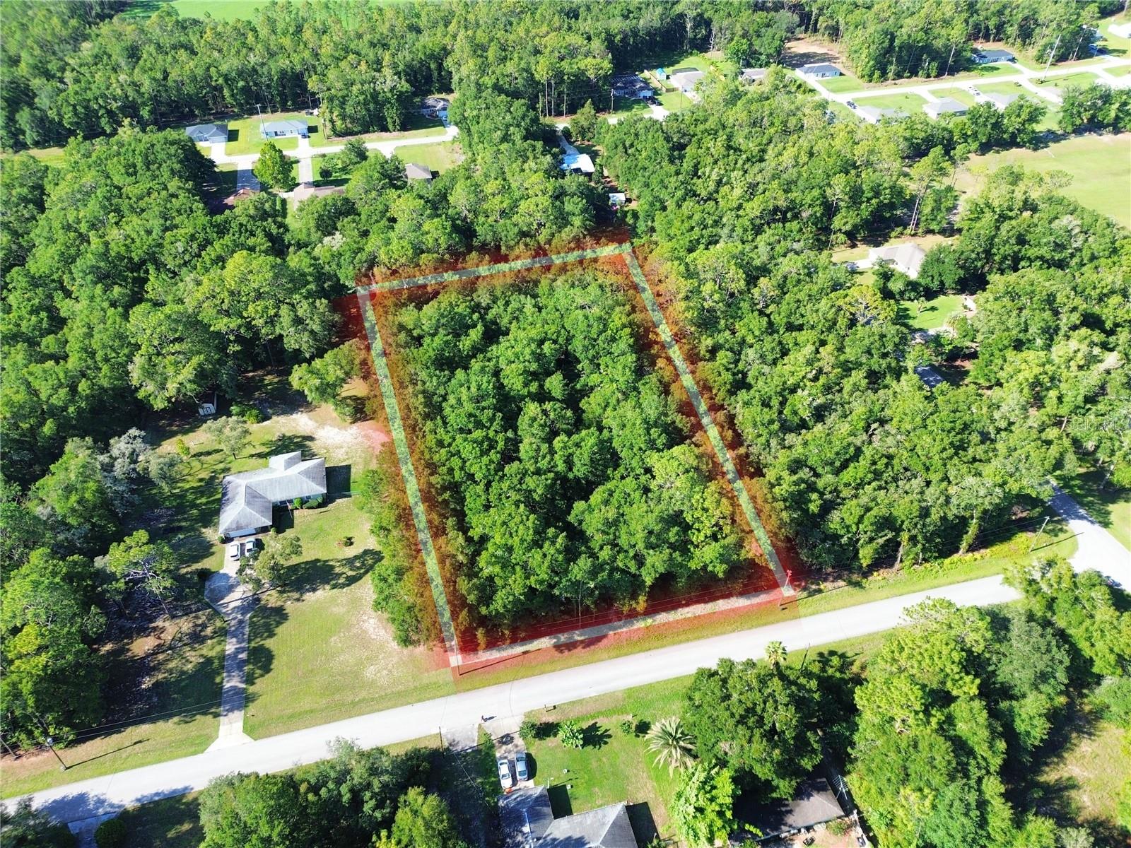 1.84-acre level lot in Dunnellon’s Rainbow Acres subdivision, zoned R1 for single-family homes. Located in Flood Zone X with no flood insurance typically required. Well needed; electricity nearby. Infrastructure projects are advancing, with public water expected soon. Great opportunity to build in a growing area. Coordinates: 29.12952065, -82.44769725. Parcel #: 1751-012-004 2024 taxes: $429.49.