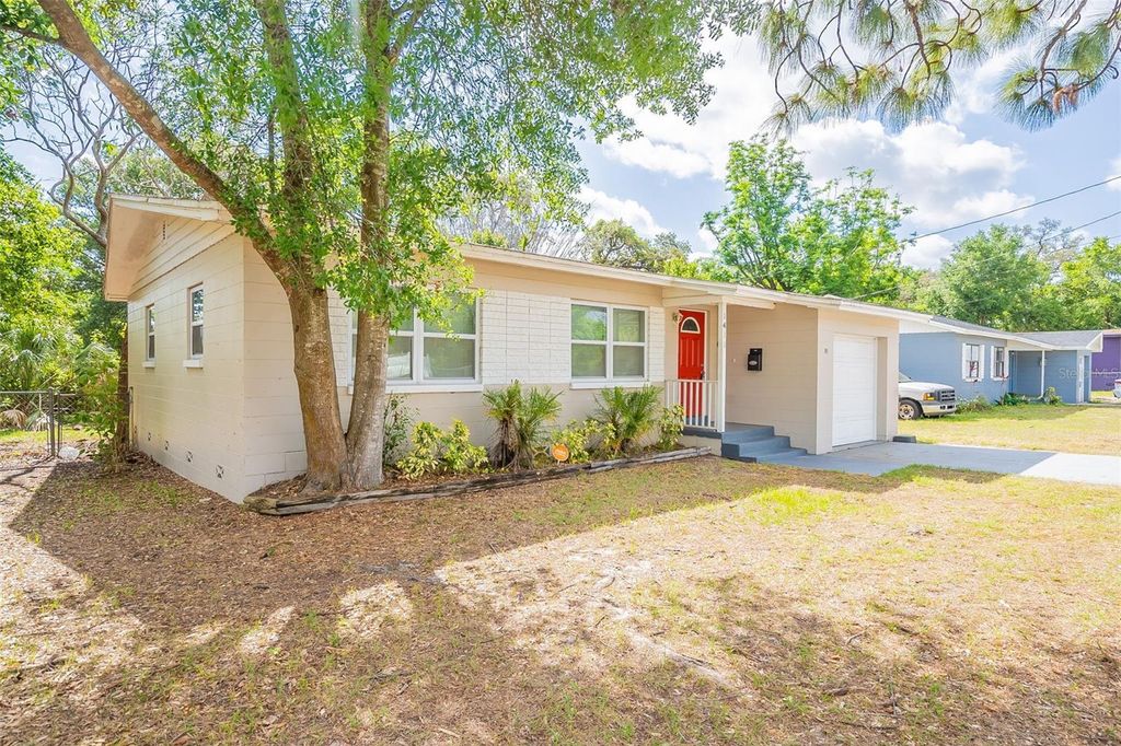 Photo of 1411 N Powers Drive, Orlando, FL 32818 (MLS # O6354503)