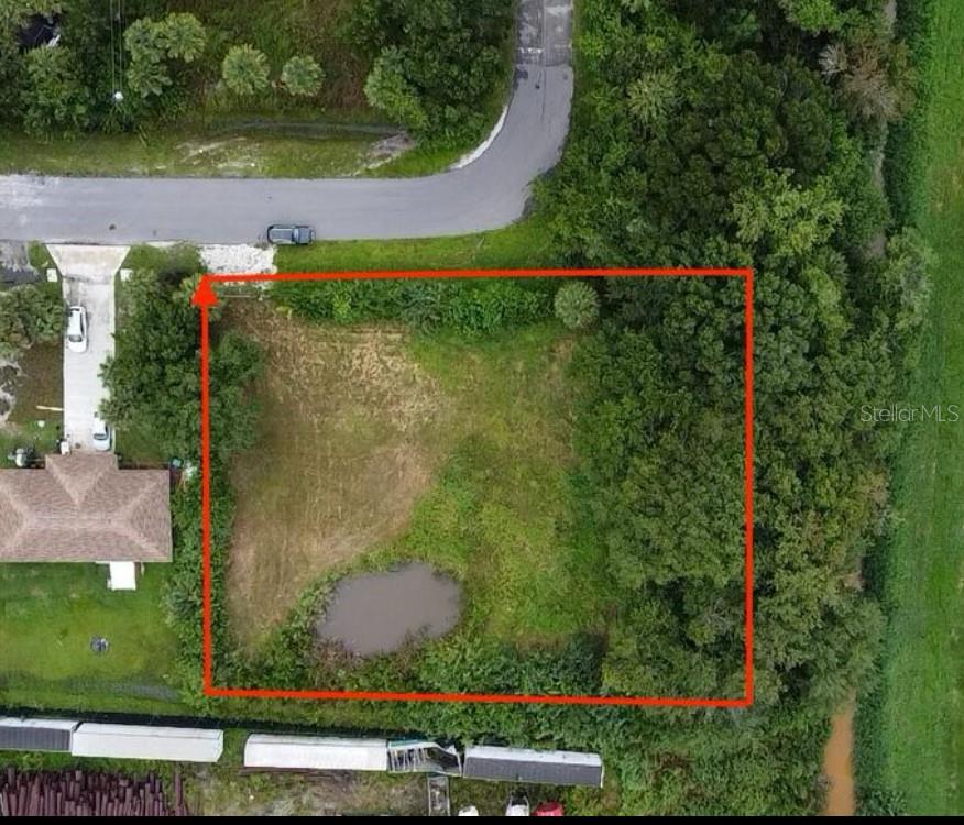 Basswood Estates: Here is your chance to grab two lots side by side and build your dream home on a half an acre in Basswood!! This is an opportunity that you can't miss. This .55 acre lot comes with several fruit trees an is partially cleared.