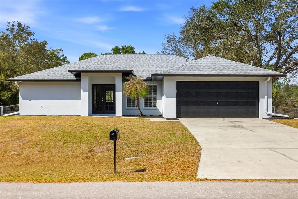 Photo of 1621 Mcarthur Avenue, Lehigh Acres, FL 33972 (MLS # A4684922)