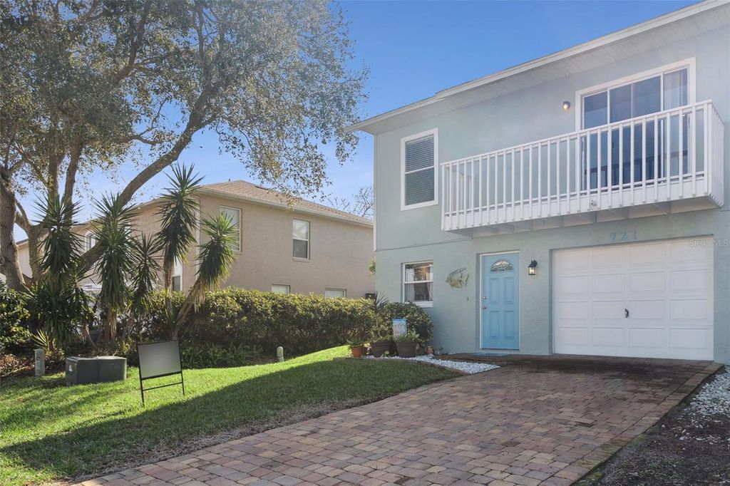 Photo of 721 Laurel Bay Circle, New Smyrna Beach, FL 32169 (MLS # O6371257)