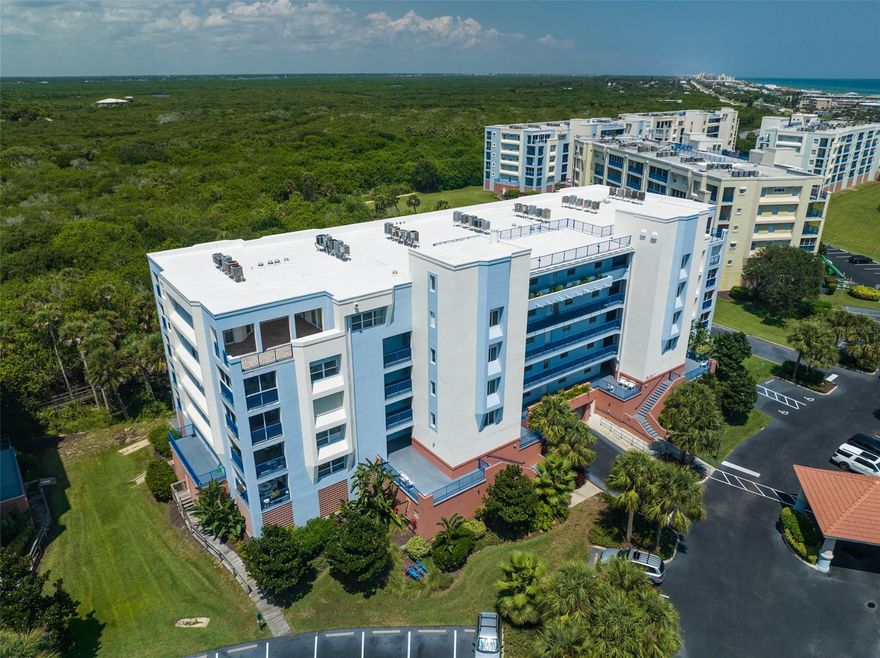 UPDATED OCEANWALK CONDO!  Located in the desirable Ocean Walk condo complex, this well appointed 2 bedroom, 2 bath, 1,389 SQ FT condo on the 2nd floor of Building 7 is just a short walk to the ocean, pool, and clubhouse. This turn key condo comes fully furnished!  Recent updates include: new light and plumbing fixtures throughout, new quartz countertops, new kitchen tile backsplash, new furniture and decor, new interior paint, and new window treatments.  Luxury vinyl plank flooring throughout!  A spacious balcony for you to enjoy the cool ocean breezes and views of the Estuary.  This condo has strong rental history and inside laundry!  Located on the no drive portion of beautiful New Smyrna Beach. This is a gated complex with garage parking.  Amenities include: two pools, tennis courts, gas grills, jacuzzi, two fitness centers, shuffleboard, movie theater, and two clubhouses. ;Water: City