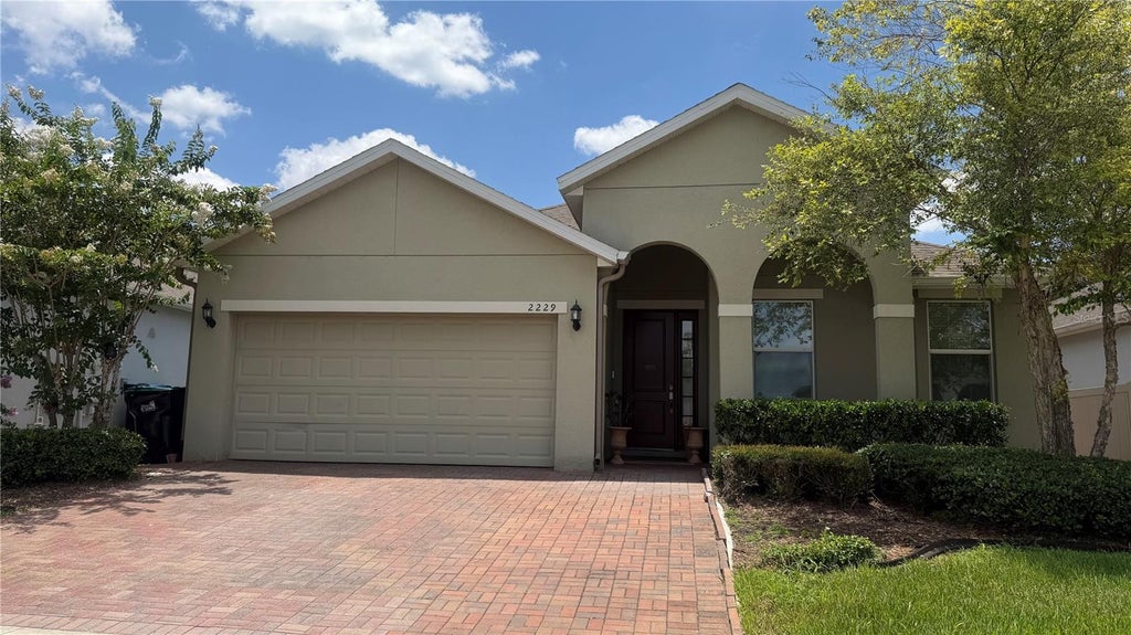 Photo of 2229 Rush Bay Way, Orlando, FL 32824 (MLS # O6427117)
