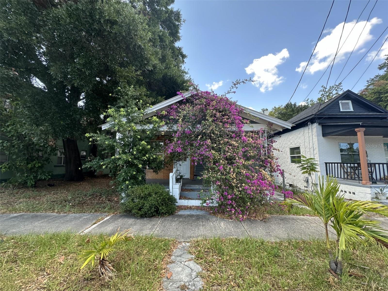 Investor special! Fixer upper in a fantastic up & coming part of Tampa with plenty of potential equity to earn with appropriate finishes. Home needs full interior, paint, AC, rough plumbing and wiring done and/or partially done. Some work has been completed, interior has been reframed to improve layout. Home needs a spiral staircase for access to the upstairs, and then you will have an awesome crows-nest style primary bedroom with en-suite bath. Contractor estimates $85k in work to complete with a $375k ARV. Contractor available to complete project if desired. Seller estimate only. Some tree/water damage at the rear of the home not pictured currently. Easily repairable, or use as justification to easily increase square footage. Buyer to verify and determine their own measurements, estimates and valuation. Cash only, looking to close quick.