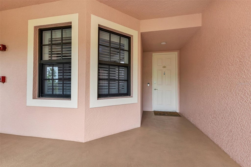 Photo of 24399 Baltic Avenue #202, Punta Gorda, FL 33955 (MLS # C7531453)
