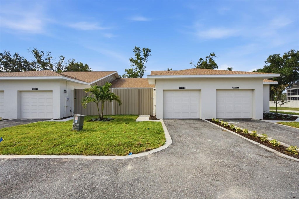 Photo of 1411 Oak Pl #C, Apopka, FL 32712 (MLS # O6440399)
