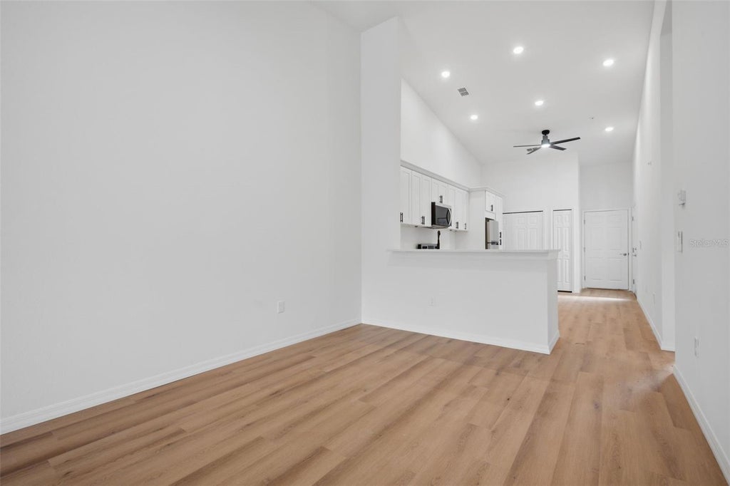 Photo of 1411 Oak Pl #C, Apopka, FL 32712 (MLS # O6440399)