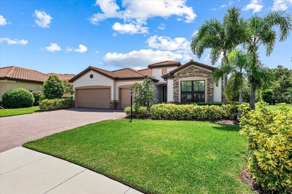 Photo of 9730 Carnoustie Place, Bradenton, FL 34211 (MLS # A4664669)