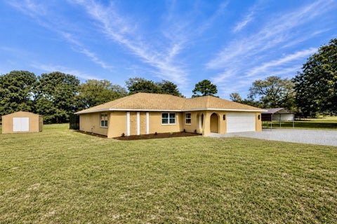 Photo of 9086 Grove Road, Brooksville, FL 34613 (MLS # TB8510559)