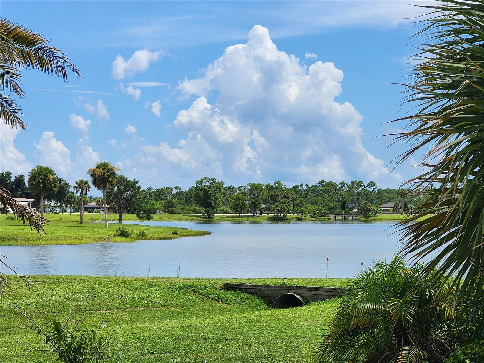 Located at the end of a quiet CUL-DE-SAC, this lot offers a GORGEOUS WATER VIEW! This parcel is CLEARED and ready for you to place your dream home here. The WATER METER is in place which will save you thousands! Public sewer is also available at the street. In addition, this property is not located within a scrub-jay zone. Village of Holiday Lake is an active, GULF-ACCESS, waterfront community with 28 boat slips and a PRIVATE BOAT RAMP. This is SAILBOAT WATER which means there are NO BRIDGES out. This community features TWO POOLS, a large recreation facility, fitness center, woodworking shop, craft room, laundry facilities, tennis courts, shuffleboard, pickleball, and more! There are two, enclosed STORAGE COMPOUNDS on-site for your RV and/or boat. GROUNDS MAINTENANCE is also included in the low monthly association fee. Come see for yourself why Village of Holiday Lake is the perfect place to live.