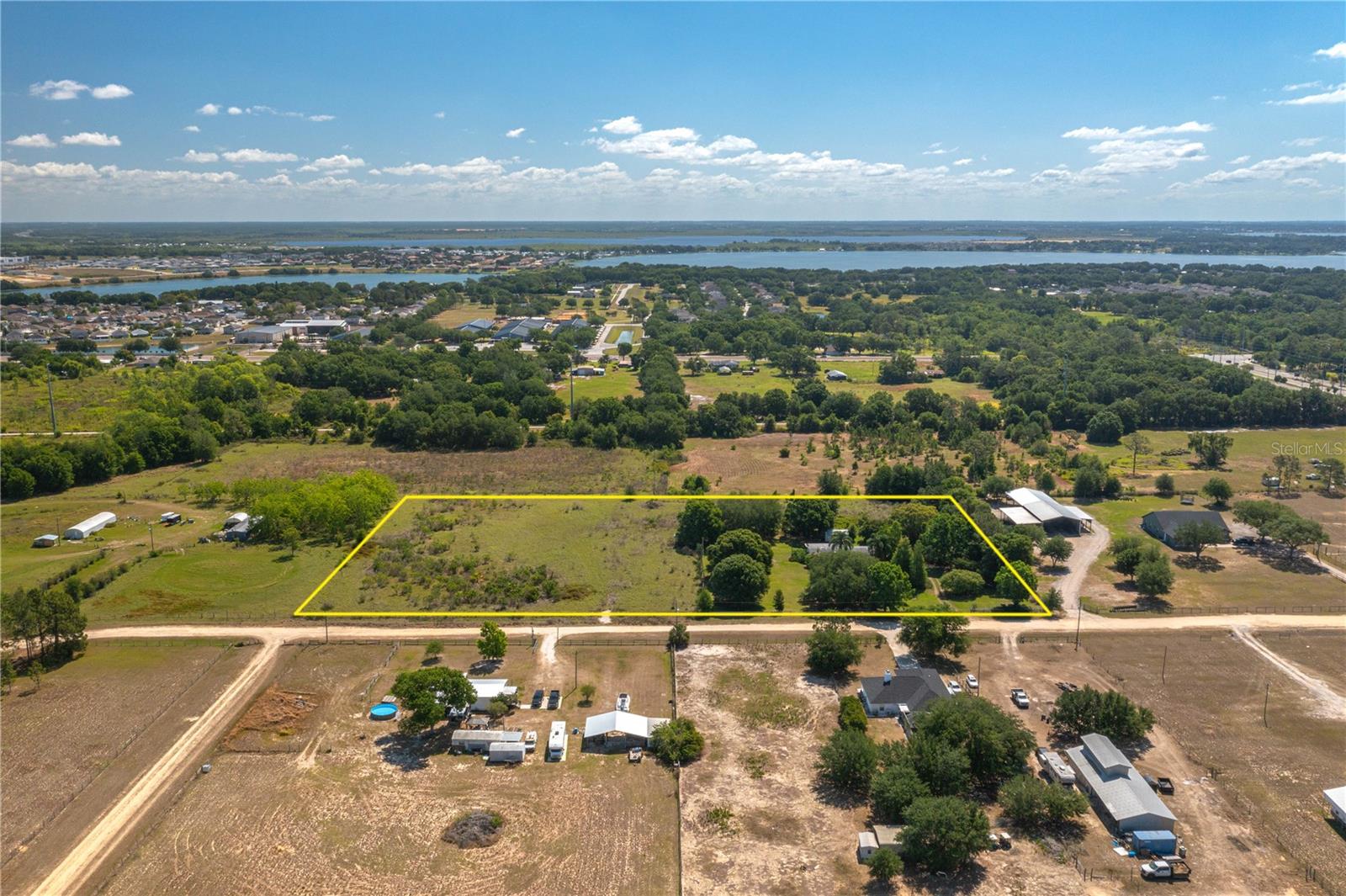 Endless Possibilities on 6.23 Acres in Auburndale!
Looking for land to build your dream home? This 6.23-acre property in the heart of Auburndale could be your perfect match. Tucked away from the hustle and bustle, this spacious parcel offers the ideal setting for a custom-built home with plenty of room to stretch out and enjoy the peaceful, rural lifestyle. The property currently features a single-wide mobile home that needs some TLC and will not qualify for traditional financing. However, it could serve as a convenient temporary residence while your new home is under construction. Whether you're envisioning a private homestead, hobby farm, or a place to simply enjoy the open space, this property offers the flexibility to bring your vision to life. Don't miss this opportunity to own a sizable piece of land with great potential in beautiful Auburndale!