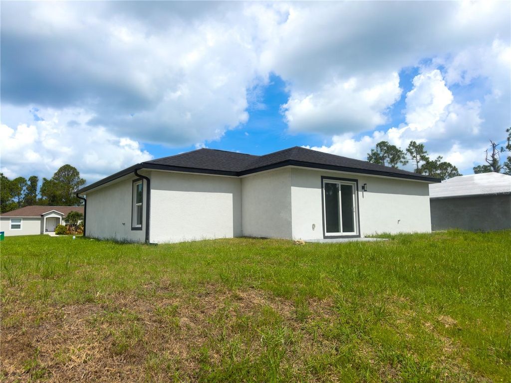 Photo of 3602 Gillot Boulevard, Port Charlotte, FL 33981 (MLS # O6365630)