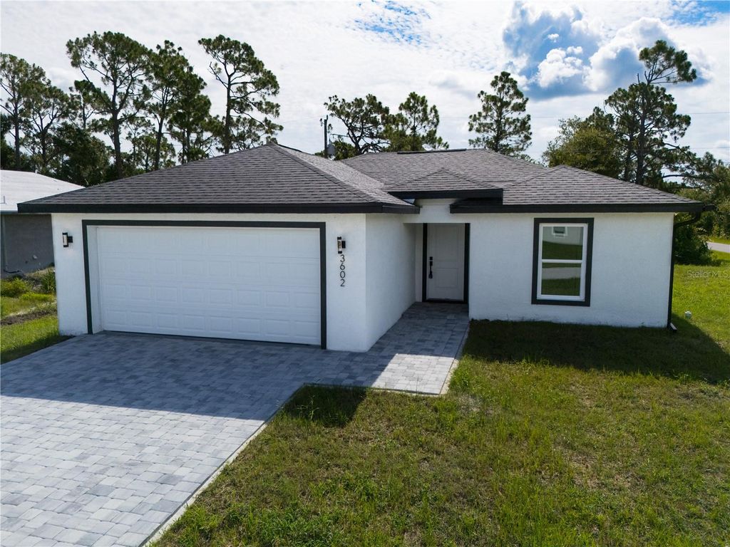 Photo of 3602 Gillot Boulevard, Port Charlotte, FL 33981 (MLS # O6365630)
