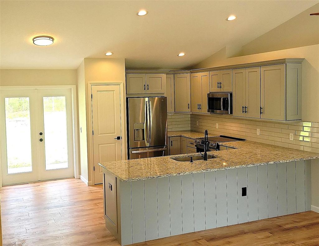 Photo of 1730 Berrybush Street, Bunnell, FL 32110 (MLS # FC317594)