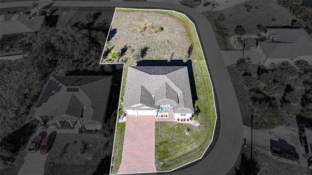 Photo of 9401 President Circle, Port Charlotte, FL 33981 (MLS # D6145708)