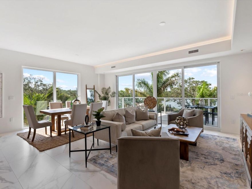 Experience elevated waterfront living at Serena by the Sea in this stunning 3-bedroom, 3-bathroom residence offering over 2,100 square feet of thoughtfully designed space. Built in 2023, this modern condo features an open-concept layout with high ceilings, a spacious living and dining area, and a split-bedroom floor plan for added privacy.

The gourmet kitchen is equipped with premium appliances, sleek cabinetry, and elegant finishes, seamlessly flowing into the main living area—perfect for both everyday living and entertaining. The primary suite offers a tranquil retreat with a walk-in closet and a beautifully appointed en-suite bathroom.

Enjoy partial water views of the Intracoastal and Tampa Bay, along with resort-style amenities including a heated lap pool, saltwater pool, fitness center, clubhouse, and gated entry. This residence also includes assigned covered parking and additional storage.

Ideally located in Clearwater, just minutes from world-renowned beaches, dining, and shopping, this is a rare opportunity to own a luxury waterfront condo in one of the area’s most desirable communities.