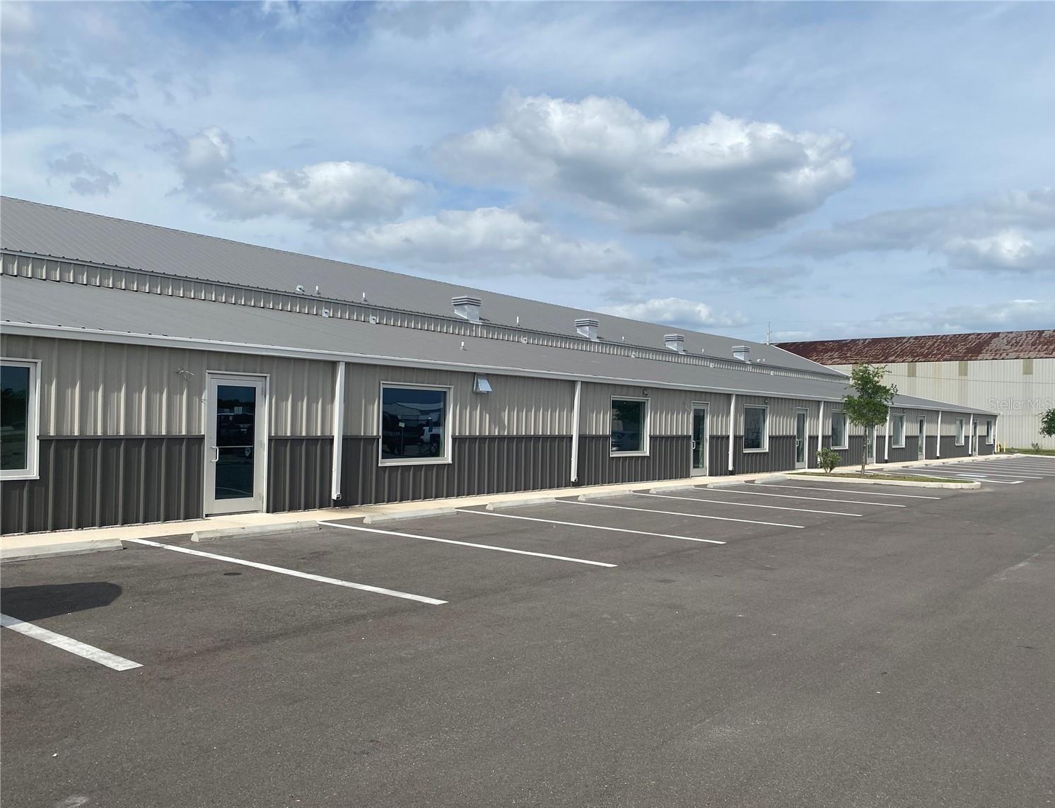 New Office/Warehouse in the heart of newer gated industrial park off of Orient Road. Triple Net Lease, 3-5 year lease available. Text Listing Agent to view. Thank you.