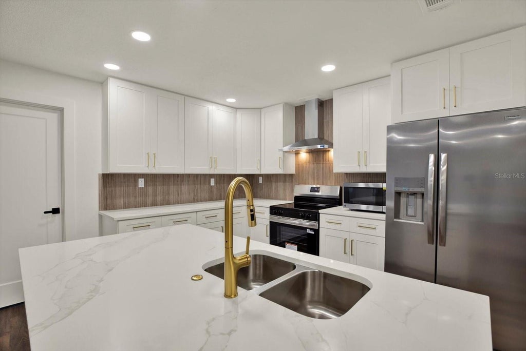 Photo of 2661 Pebble Beach Drive, Clearwater, FL 33761 (MLS # TB8555397)