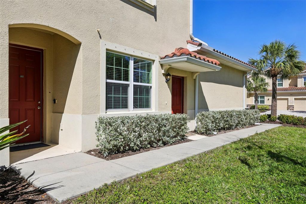 Photo of 8382 Enclave Way #102, Sarasota, FL 34243 (MLS # A4687724)