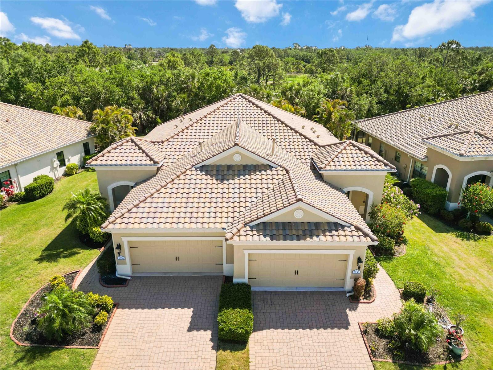 Welcome to your partially FURNISHED dream retreat in the heart of the luxury, maintenance-included community of Grand Palm in Venice, Florida. This custom-decorated and thoughtfully designed villa is nestled on a quiet and private street, offering peace and serenity while still enjoying the vibrant lifestyle Grand Palm is known for. Located in the preferred Flood Zone X500, flood insurance is not required, and the home has remained unaffected by hurricanes thanks to its high elevation and comprehensive hurricane protection, including Storm Smart Hurricane Shutters. Inside, you’ll find elegant finishes throughout—plantation shutters, crown molding, upgraded lighting, and beautiful flooring that flows seamlessly from room to room. The chef-inspired kitchen is a standout feature with its natural gas stove, granite countertops, stylish tile backsplash, and a spacious center island perfect for cooking and entertaining. The flexible den/office easily serves as a third bedroom, ensuring guest comfort. The spacious primary suite includes an upgraded barn door for added charm and privacy. Step out onto the peaceful lanai and enjoy tranquil views of nature—a perfect spot to unwind and soak in the serenity of your surroundings. With a 2022 A/C system, 2020 Hot Water Heater and a home water softener system plus lawn maintenance that is included in the HOA, you can fully embrace a carefree, resort-style lifestyle. Grand Palm is a gated, amenity-rich community featuring three pools, a clubhouse, fitness center, tennis and pickleball courts, basketball courts, splash pad, and a full-time activities director. Nature lovers will appreciate the mature landscaping, natural preserves, miles of hiking and biking trails, and kayaking opportunities. Ideally located just minutes from historic downtown Venice with its boutique shops and dining, and with easy access to I-75, this home offers the perfect combination of luxury, comfort, and convenience.
