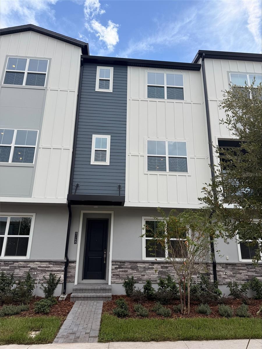 Photo of 9148 Sinatra Lane, Orlando, FL 32827 (MLS # O6441347)