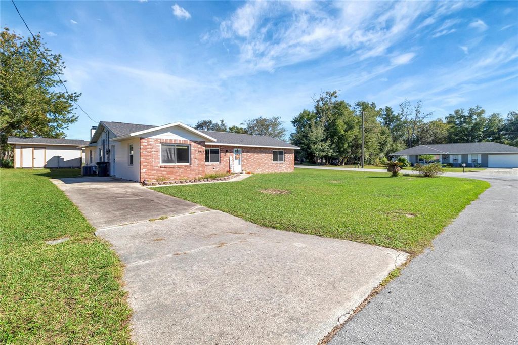 Photo of 6989 SE 52 Place, Ocala, FL 34472 (MLS # OM712727)