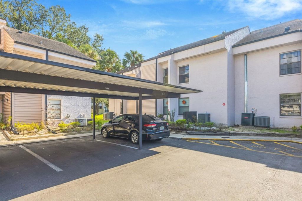 Photo of 5155 Puritan Circle #1021, Tampa, FL 33617 (MLS # TB8452304)