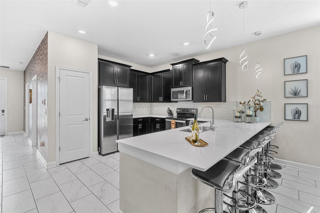 Photo of 9032 Sommerset Hills Drive, Davenport, FL 33896 (MLS # O6436920)