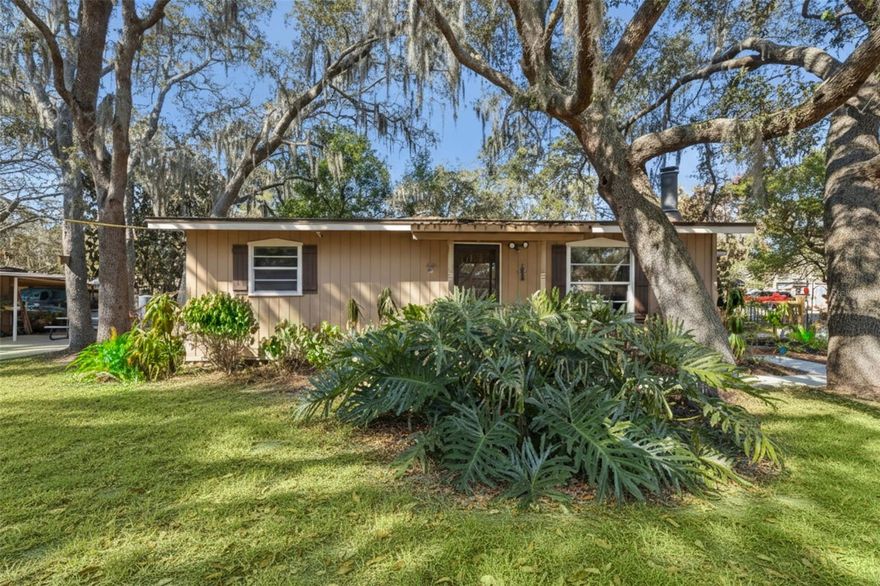 **This house comes with a REDUCED RATE through the seller's preferred lender. This is a lender-paid rate buydown that reduces the buyer's interest rate and monthly payment.**

Located in the heart of Apopka, 1366 Wildwood St offers a great opportunity for buyers looking to add their personal touch. This 2 bedroom, 1 bathroom home sits on a 0.17 acre corner lot with no HOA, providing flexibility and room to grow. A brand new roof is scheduled to be installed in February 2026, offering added value and peace of mind for the future owner.

Inside, you will find a functional layout and a cozy wood burning fireplace that adds warmth and character to the main living area. The home offers a classic interior with an opportunity for cosmetic updates, making it a great option for buyers who want to personalize the space.

The corner lot offers extra yard space for gardening, pets, or future improvements. With no HOA restrictions, you have the freedom to truly make this property your own.

Conveniently situated near US 441 and State Road 429, commuting throughout Central Florida is simple. Everyday shopping and dining options are just minutes away, including Publix and Walmart. Outdoor enthusiasts will also appreciate the close proximity to Wekiva Springs State Park, known for its natural springs, trails, and kayaking.

If you are searching for a property with solid bones, a desirable lot, and plenty of upside potential in a growing area, this could be the one.