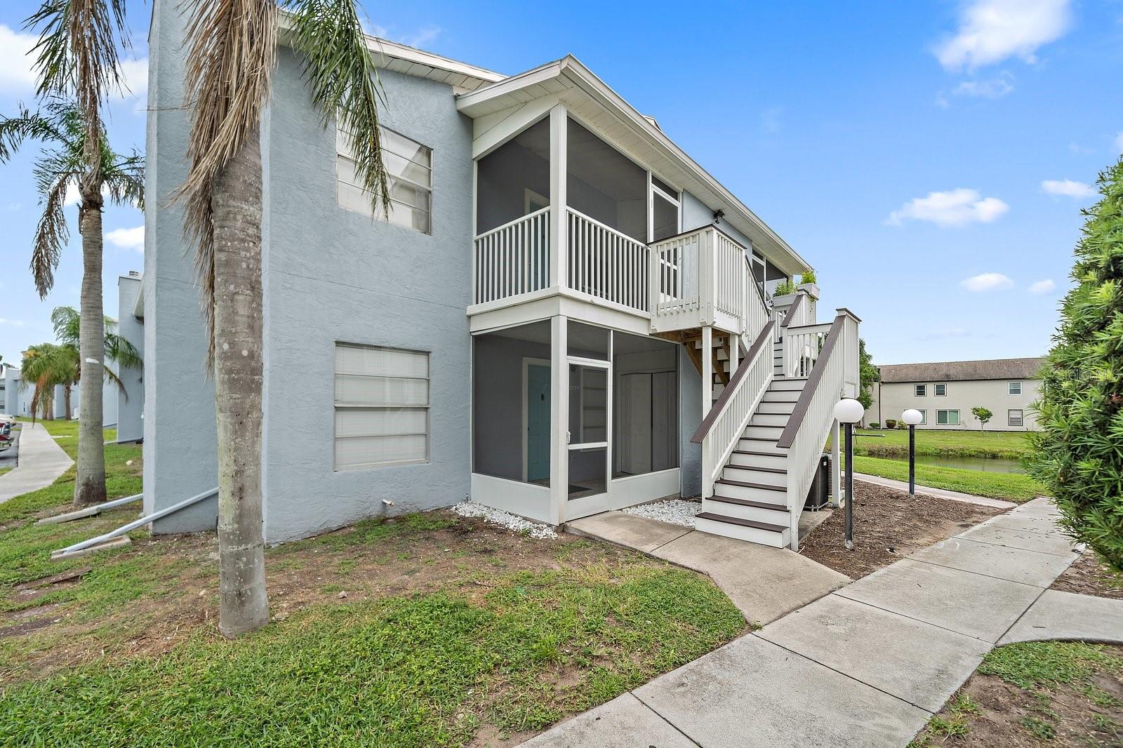This inviting 2-bedroom 2 bath, second-floor condo offers comfort, convenience, and style in a prime West Bradenton location. Featuring tile flooring in main living areas and comfortable carpet in the bedrooms, the home is both bright, light and easy to maintain. The focal point of the spacious living area is a charming decorative fireplace, creating a cozy feel. A brand-new air conditioner ensures year-round comfort, while the thoughtfully designed layout includes two bedrooms and two bathrooms, providing privacy and space for residents and guests alike. For your convenience, there's a laundry closet with washer and dryer included in the sale. Ideally situated near IMG Academy and the State College of Florida, this home offers quick access to local shopping, dining, and beautiful Gulf beaches, making it a perfect choice for both full-time living and seasonal enjoyment. Mirror Lakes is deed restricted and it shows! Beautiful grounds landscaping and fabulous amenities like fitness center, tennis, and POOL. Buyer approval in Mirror Lakes requires a 700 or better credit score.