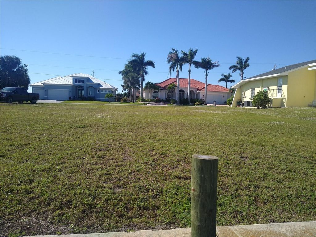 Photo of 116 Colonial Street SE, Port Charlotte, FL 33952 (MLS # A4590666)