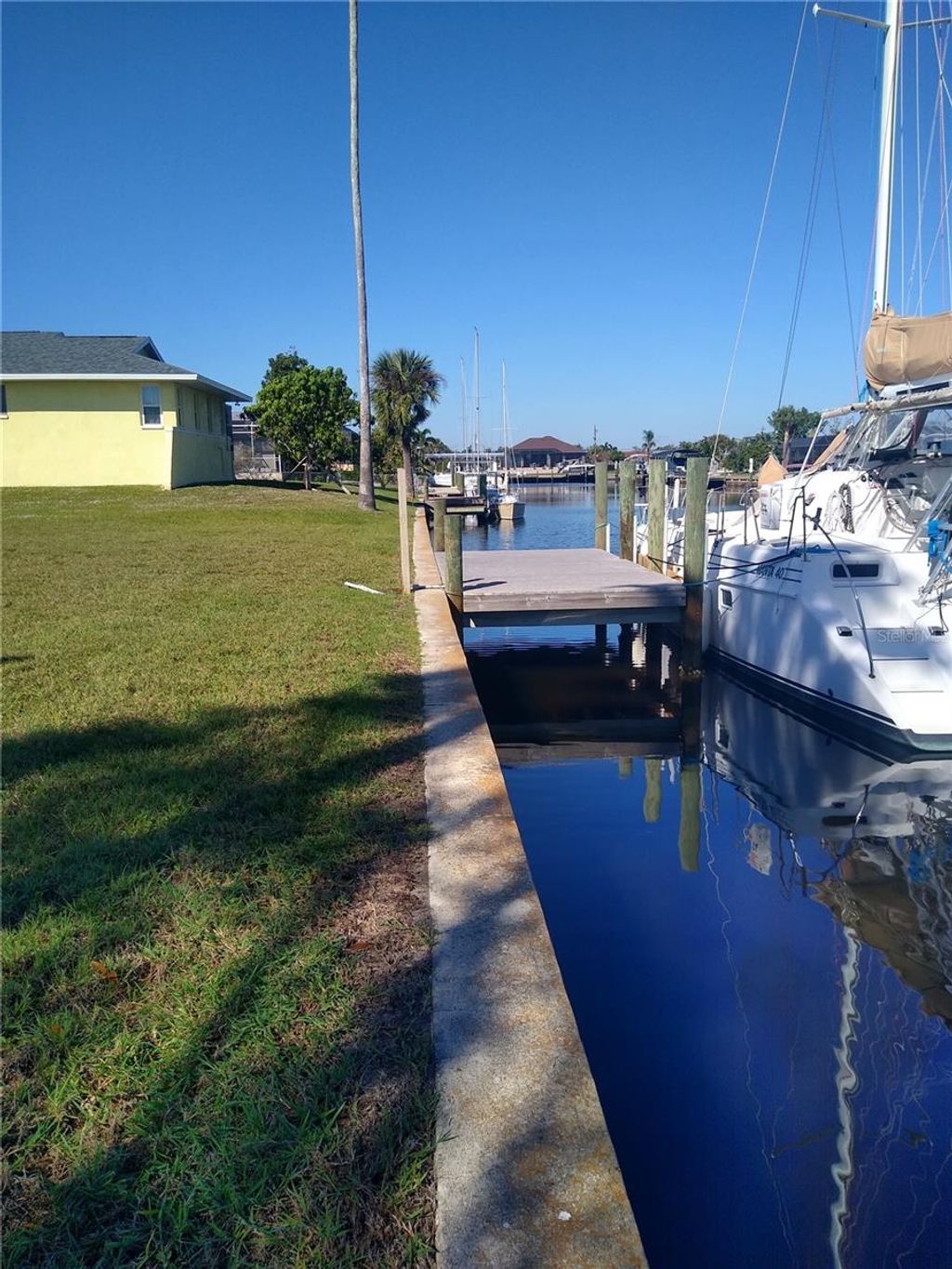 Photo of 116 Colonial Street SE, Port Charlotte, FL 33952 (MLS # A4590666)